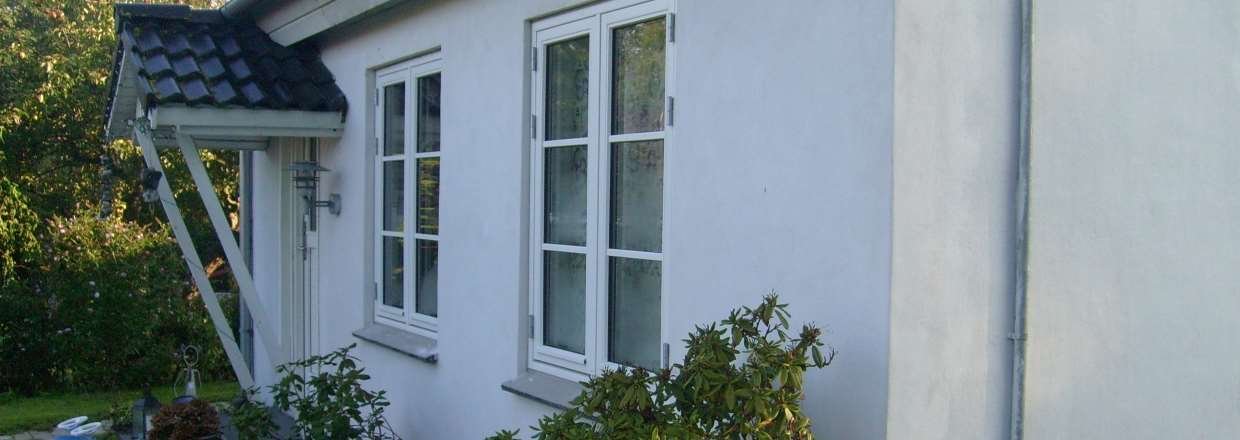 Facaderenovering med armeringsnet og filset overflade